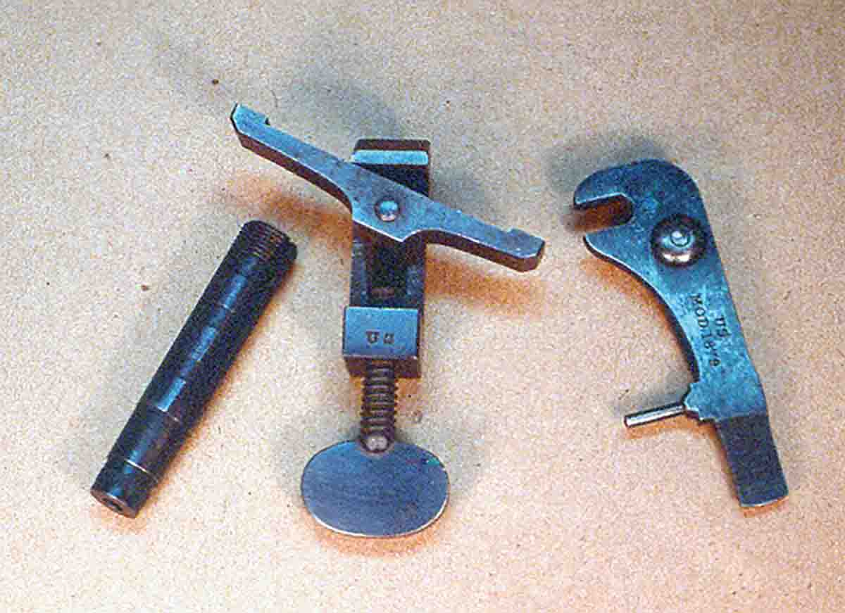 Standard Trapdoor tools – headless shell extractor, mainspring vise, and Model 1879 combination screwdriver and punch.